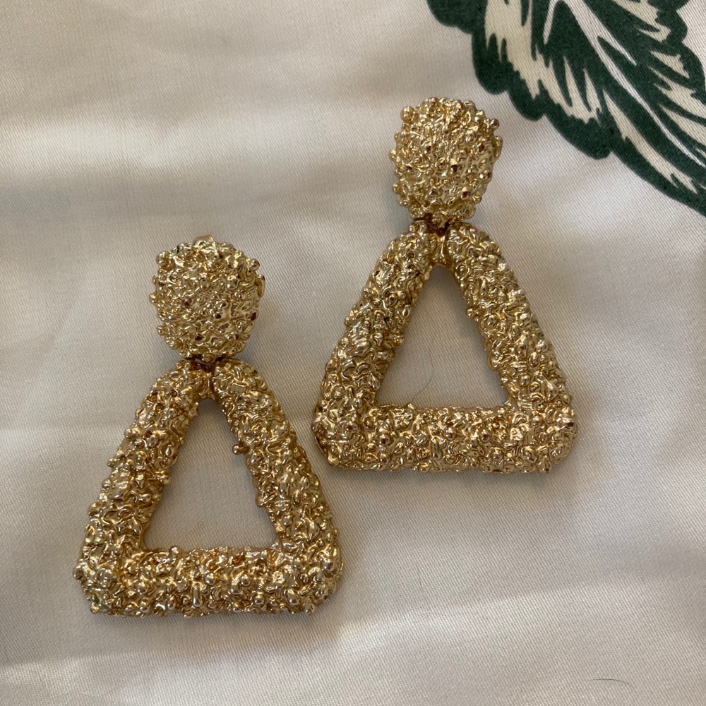 Gold pyramid styled earrings